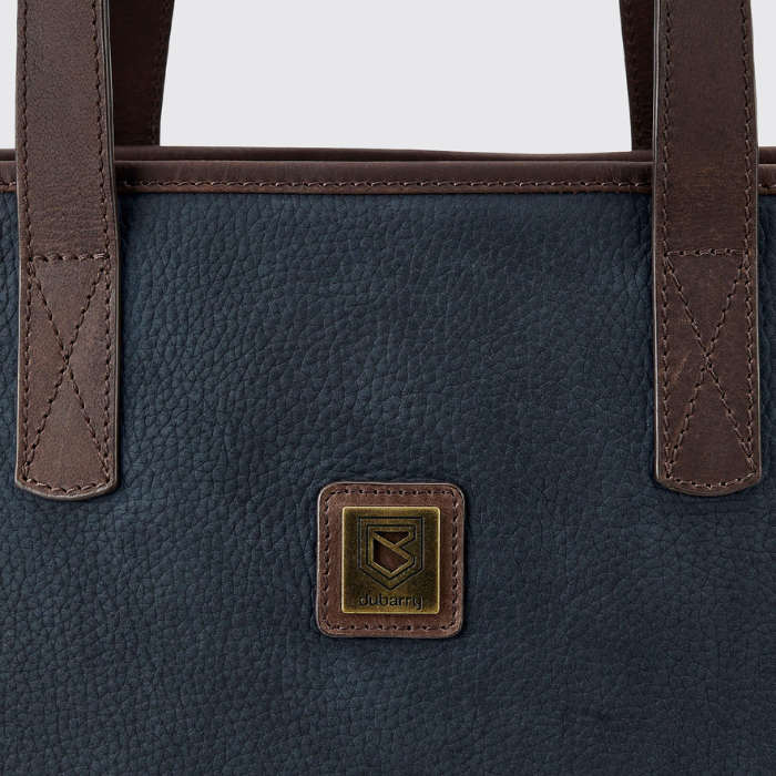 Close up of logo detail on the Dubarry Rosemount Tote Bag in Navy