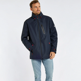 Man wears the Dubarry Mens Crossbarry Waterproof Jacket in Navy with light blue jeans