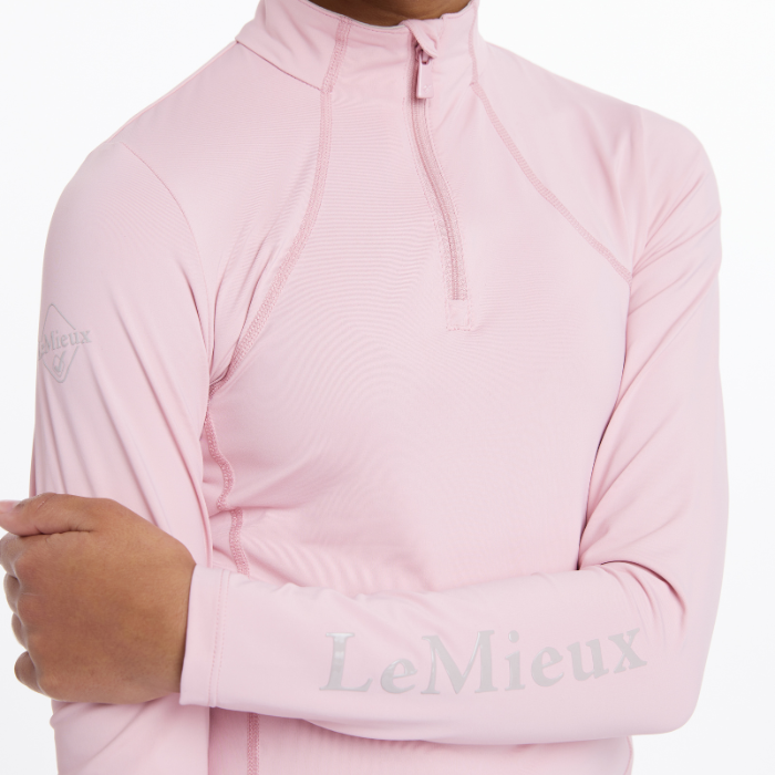 Logo sleeve detail on the LeMieux Young Riders Base Layer in blossom