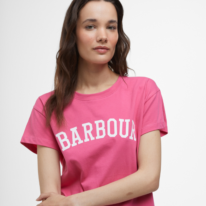 Female wears the vibrant Barbour Ladies Northumberland Classic T-shirt in Rose Pink