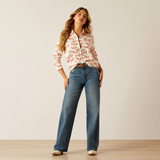 Woman styles the Ariat Ladies Rudford Shirt in Blushing Horse with casual loose fit jeans