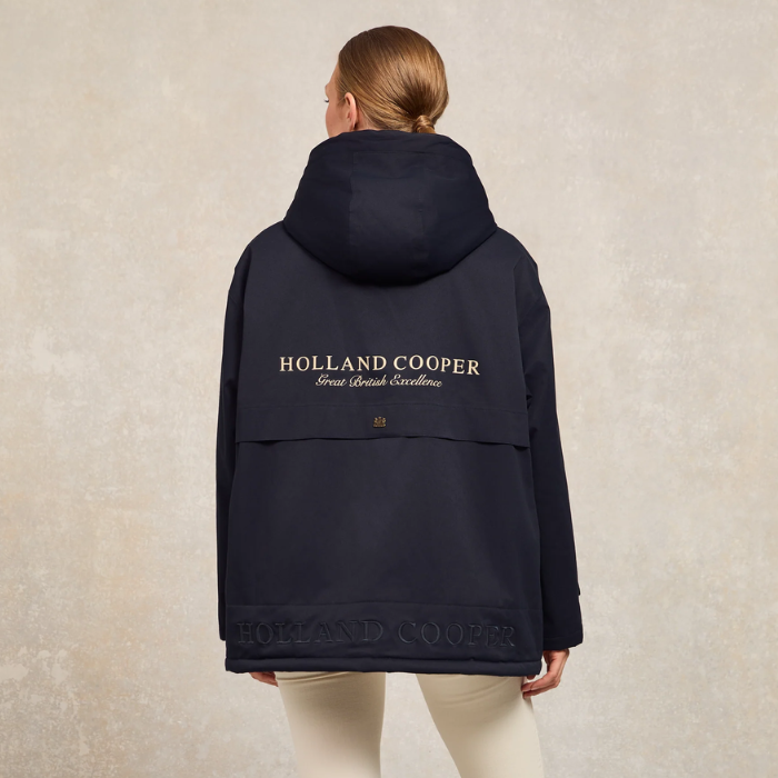 Logo detail on the reverse of the Holland Cooper One-Size Waterproof Jacket in Ink Navy