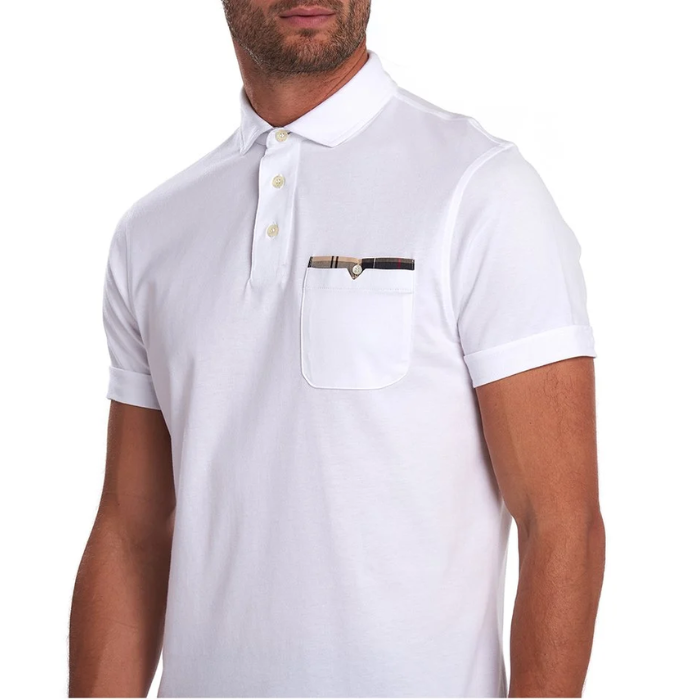 Close up of pocket detail on the Barbour Mens Corpatch Polo Shirt in white