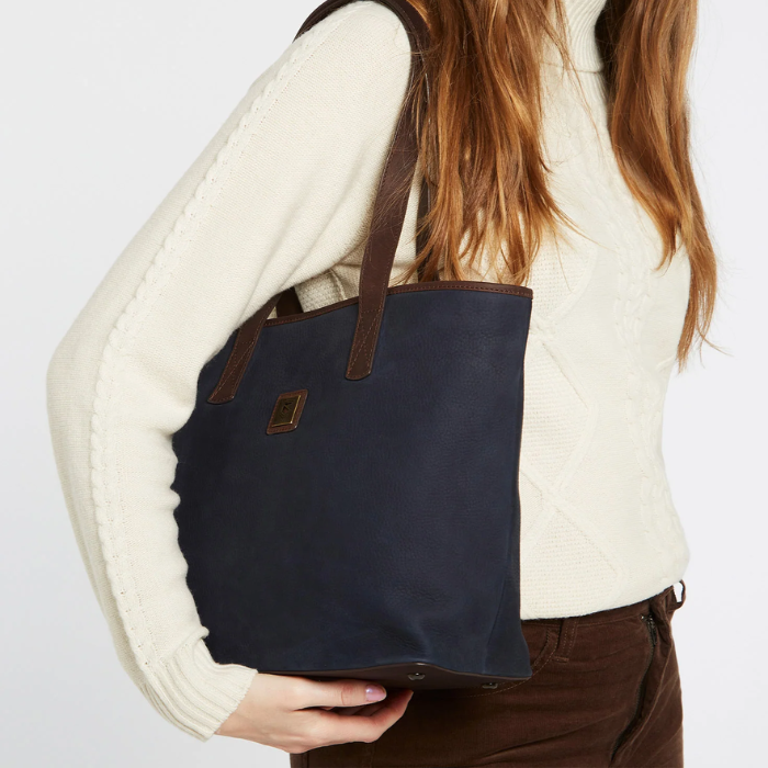 Woman wears the Dubarry Rosemount Tote Bag in Navy over her shoulder