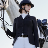 Dressage rider wears the LeMieux Ladies Zoe Show Jacket in Navy