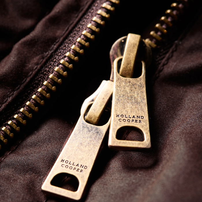 Luxury zip logo detail on the Holland Cooper Durham Wax Jacket in Chocolate