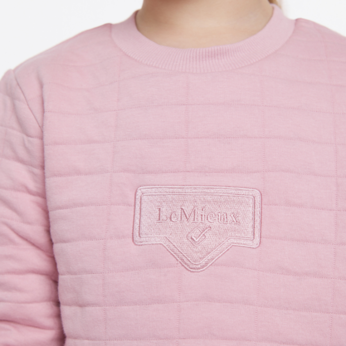 Close up logo detail on the LeMieux Mini Cici Crew in Blossom