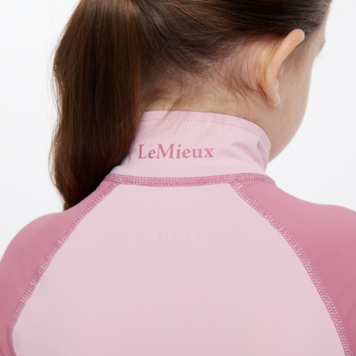 Collar logo detail of the LeMieux Mini Base Layer in Blossom