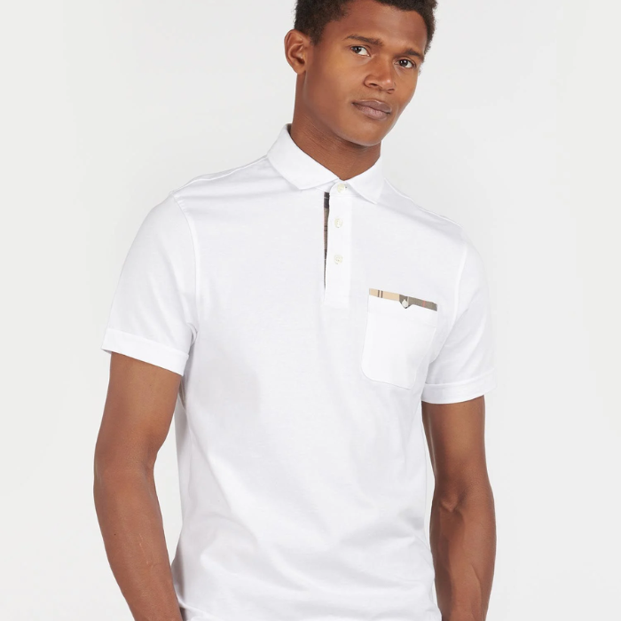 Male wears the Barbour Mens Corpatch Polo Shirt in white