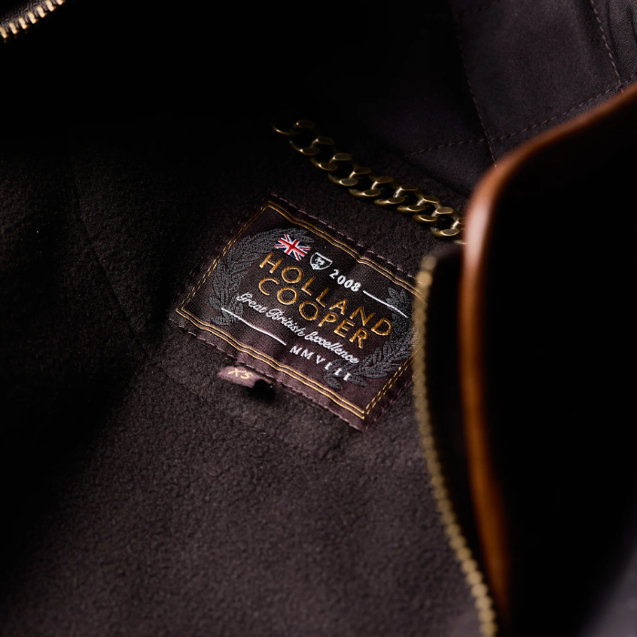 Inner logo detail on the Holland Cooper Stamford Country Coat in Chocolate