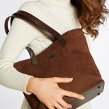 Woman holds the Dubarry Rosemount Tote Bag in Walnut