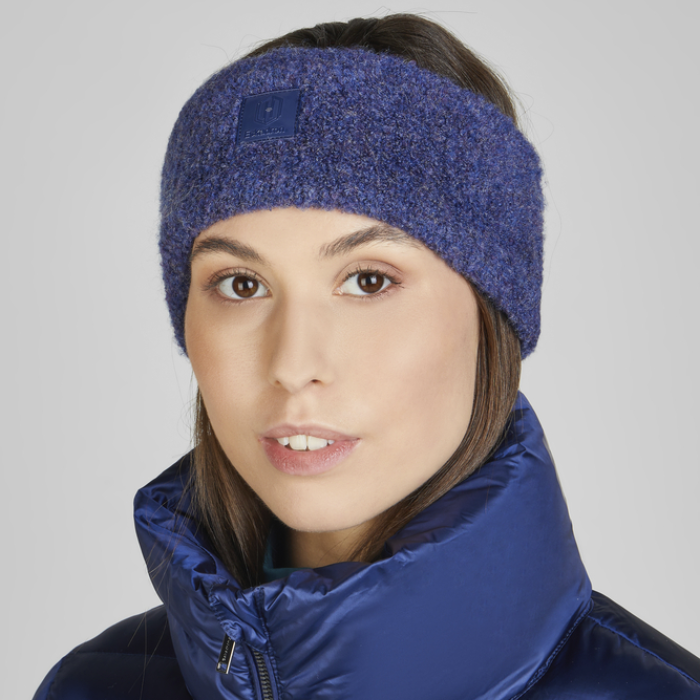 Woman wearing the Eskadron Heritage Boucle Headband in True Blue