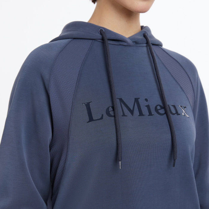 Close up logo detail on the front of the LeMieux Ladies Nadine Hoodie in dusk