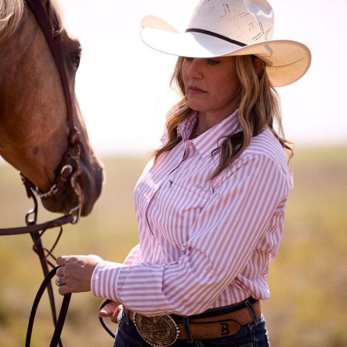 Western rider wears the Ariat Ladies VentTEK Stretch Shirt in Zephyr