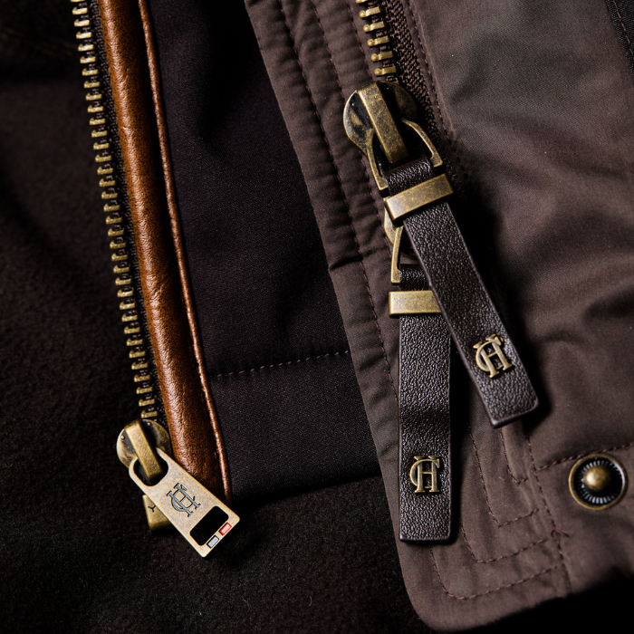 Premium logo leather zip pulls on the Holland Cooper Stamford Country Coat in Chocolate