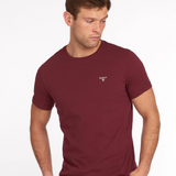 Man wears the Barbour Mens Essential Sports T-shirt in Ruby