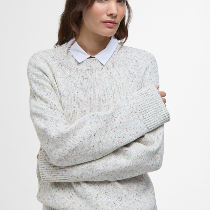 Woman wears the Barbour Edda Knitted Jumper with a crisp white shirt